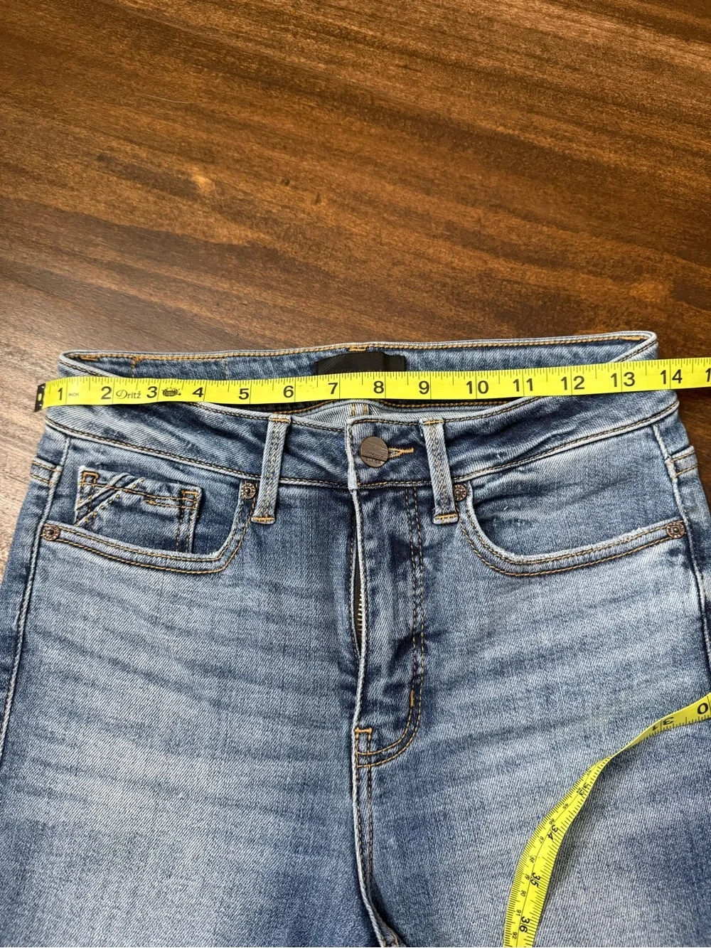 Buckle Faded Blue Skinny Jeans with Raw Hem - Picture 8 of 9